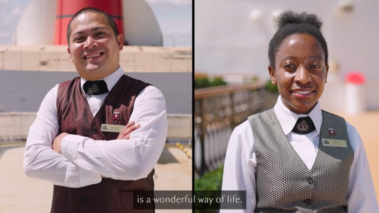 A screed grab showing a split screen. On each side is a member of onboard Cunard staff. On the left is a man and on the right is a lady. They are both wearing their Cunard uniforms (relevant to their jobs), a name badge and a white start service pin badge.